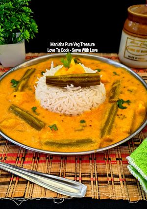 A picture of Drumstick Potato Yogurt Curry - Sahjan Aloo Besan Kadhi - Saragva Bateta Nu Khatiyo Shaak.