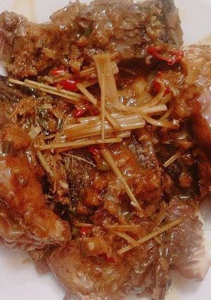 A picture of Braised Fish with Galangal and Lemongrass.