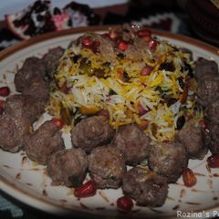 A picture of Persian Pomegranate Rice with Pistachio and Raisins.