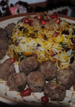 A picture of Persian Pomegranate Rice with Pistachio and Raisins.