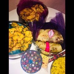 A picture of Indian inspired tiffin lunch box.