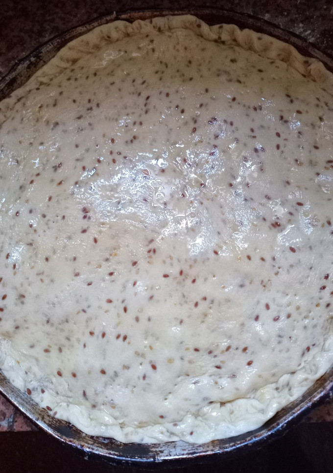 Una foto de Torta de queso y cebolla de masa con mix de semillas de lino y sésamo.😍💫😍💫😍💫