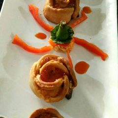 A picture of Rose shape bake cheesey snacks.