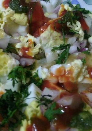 A picture of Boiled eggs with scumble eggs with all Masala.