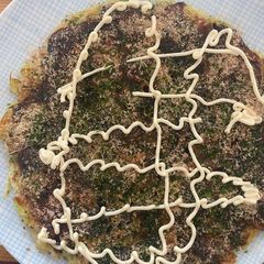 A picture of Mushroom and Manchego Cheese Okyonomiyaki.