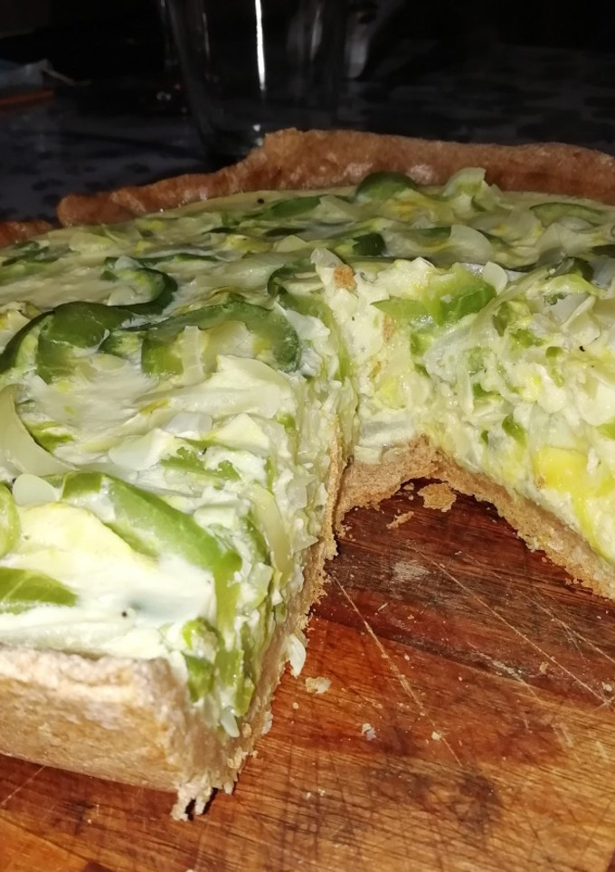 Una foto de Súper tarta de zapallitos con masa casera integral