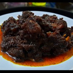 A picture of Kolkata Famous Golbari Style Mutton Kosha.