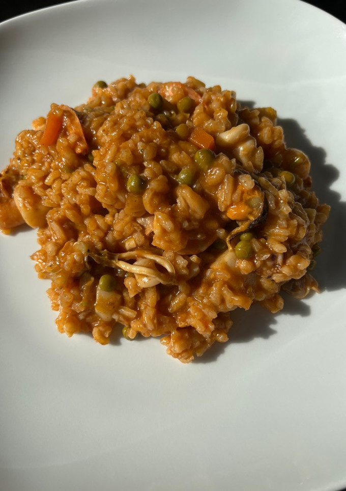 Una foto de Arroz meloso con marisco