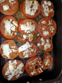 Una foto de Tomates al horno tipo pizza