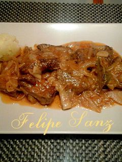 Una foto de Hígado de cordero encebollado