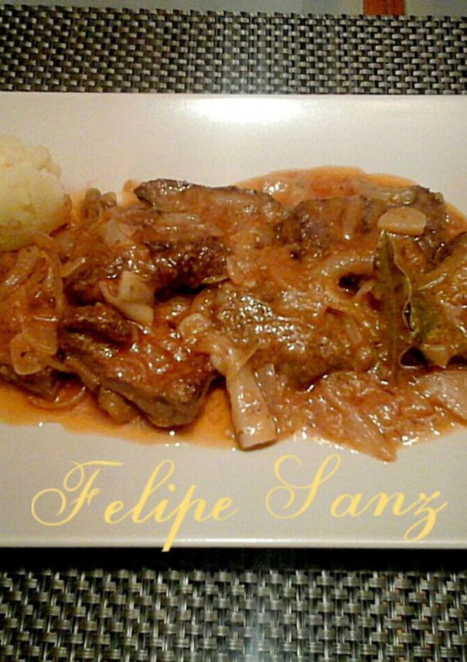 Una foto de Hígado de cordero encebollado