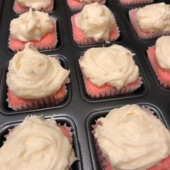 A picture of Strawberry Yogurt Cupcakes with cream cheese frosting.