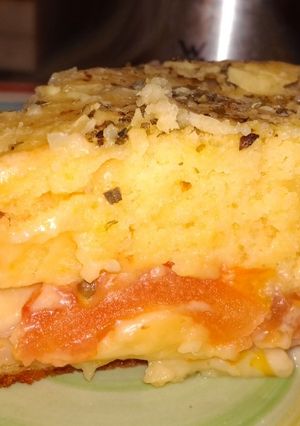 Una foto de Tarta de queso con jamón y tomate