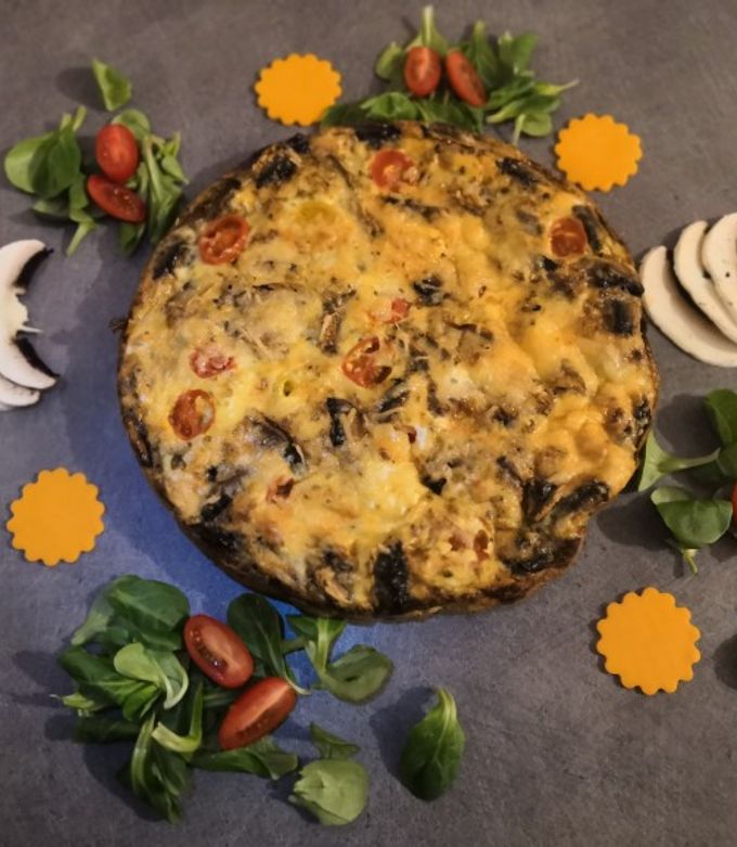 Une photo de Omelette tomates cerises/champignons de Paris, cuisson au four