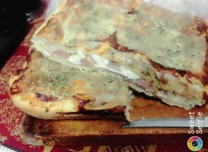 Una foto de Pizza Rellena Casera!!