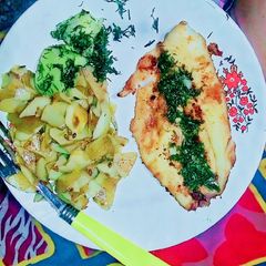 A picture of Italian Grill Fish with Skin Potatoes Salad and thyme dill Sauce.