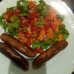 A picture of Salad and sausage.