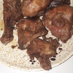 A picture of Just chicken with drink.