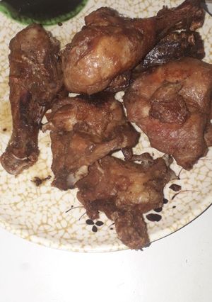 A picture of Just chicken with drink.
