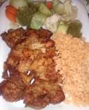 Milanesa de pierna y muslo de pollo con vegetales al vapor