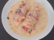 Una foto de elotes con tocino