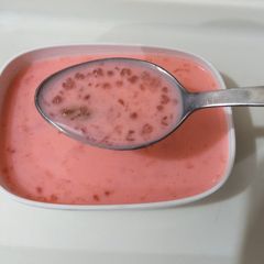 A picture of Sago with rose milk and raisen.