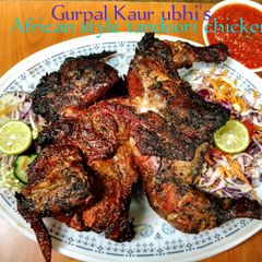 A picture of African style tandoori chicken 🐓& kachumbari mixed salad.