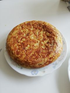 Una foto de Tortilla de patatas con cebolla