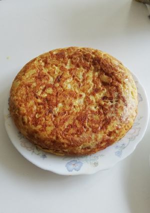 Una foto de Tortilla de patatas con cebolla