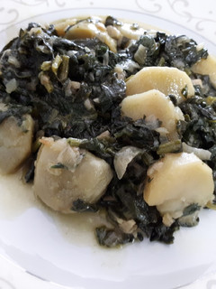 Una foto de Patatas con espinaca