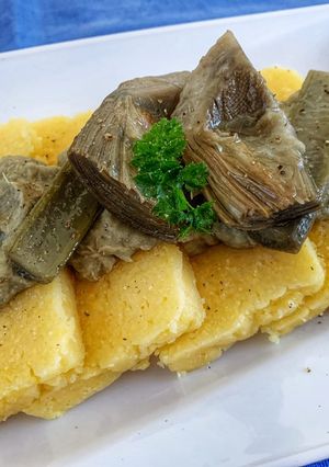 Foto di Polenta gialla con Carciofi