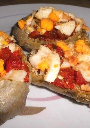Foto di Melanzane a Barcchette con Salsiccia, Scamorza Affumicata e Uova Sode al Forno