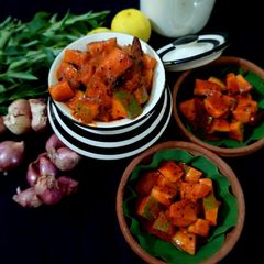 A picture of Cut raw mango pickle.