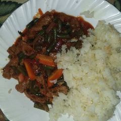 A picture of Sosy, rice and salad.