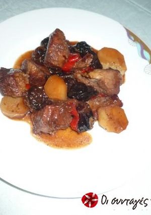 A picture of Pork with plums.