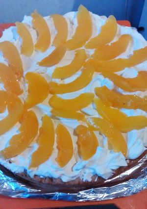 Una foto de Tarta de durazno con crema