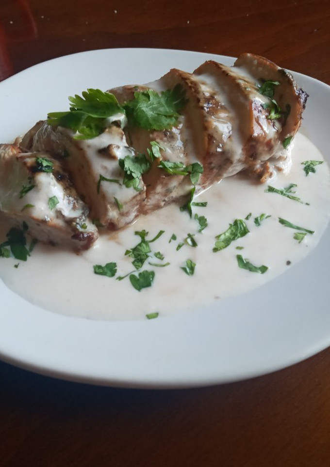 Una foto de Pechuga bañada en bechamel