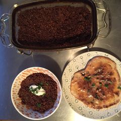 A picture of Black dal with naan.