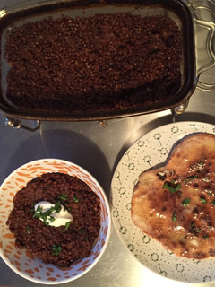 A picture of Black dal with naan.