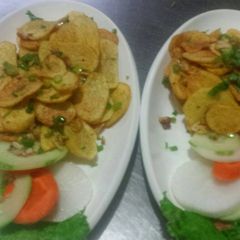 A picture of NepalI style potato fry.