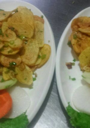 A picture of NepalI style potato fry.