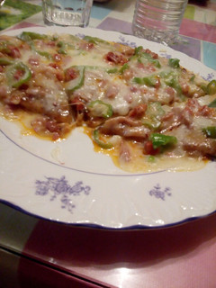 Una foto de Trozos de Pizza para cenar. Estilo Lance