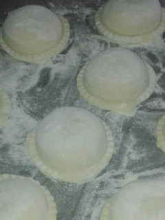 Una foto de Sorrentinos rellenos de calabaza y pollo