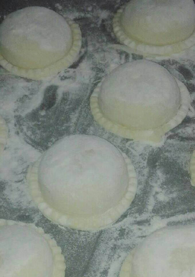Una foto de Sorrentinos rellenos de calabaza y pollo