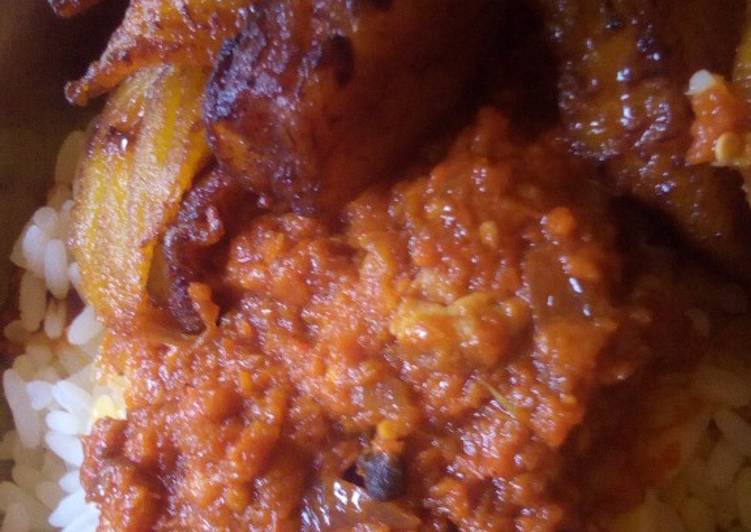 White rice, stew and fried plaintain