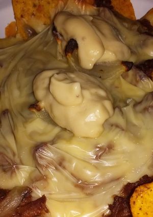 A picture of Nachos with Shredded Beef and Cheese.