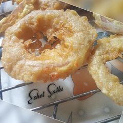 A picture of Mozzarella Onion Rings.