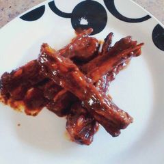 A picture of Hot Sticky Lamb Ribs with Soy and BBQ sauce.