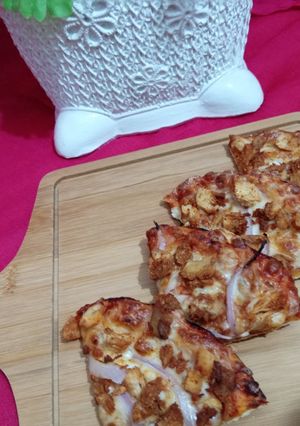 A picture of Instant Pizza In pan with out cheese.