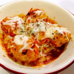 A picture of Shrimp meatball in tomato basil sauce.